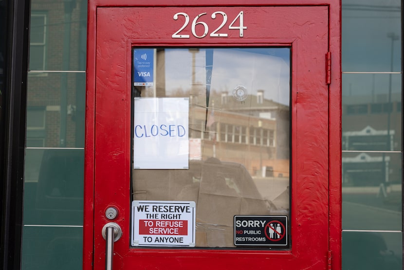 A closed sign is posted in the door of Deep Sushi in Deep Ellum on Jan. 13, 2026, in Dallas.