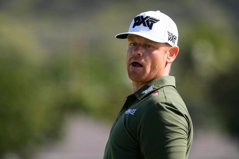 Patrick Fishburn watches his shot on the third hole during the final round of the Sony Open, Sunday, Jan. 12, 2025, at Waialae Country Club in Honolulu.