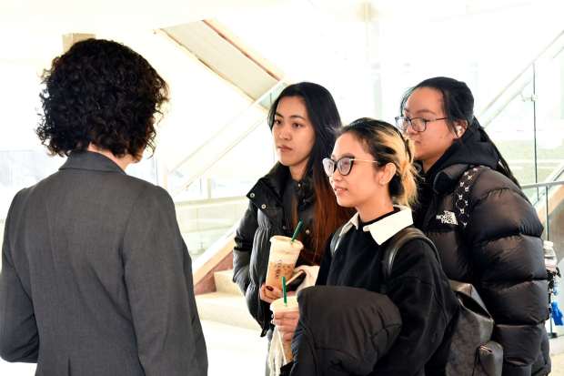 Cronin greets a group of students on opening day, Jan. 20. (COURTESY OF DCCC)