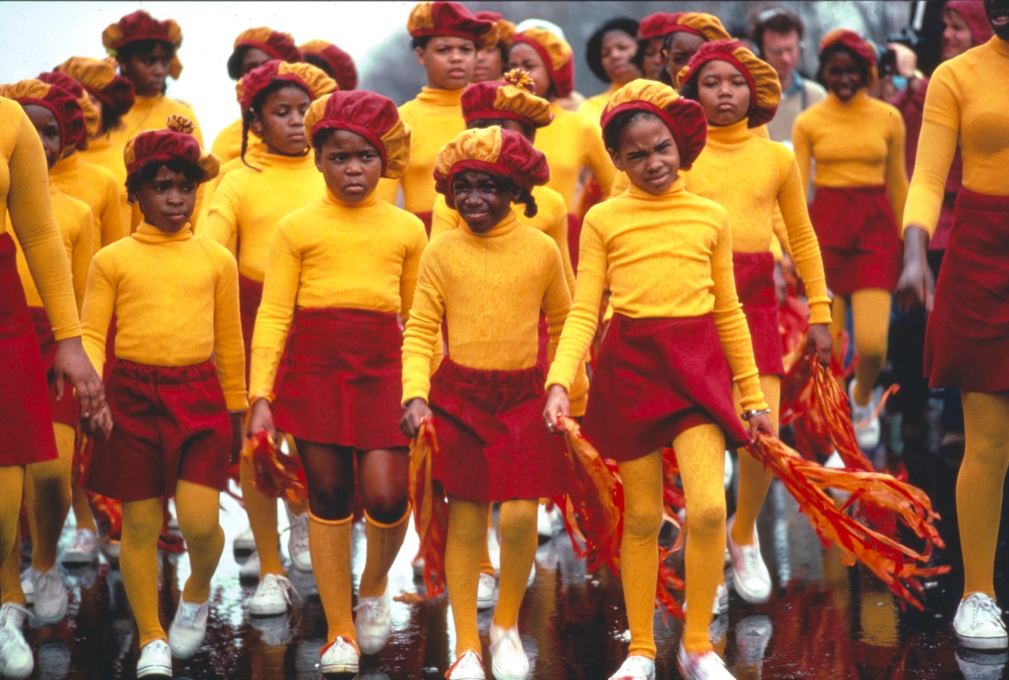 Girls marched in a Bicentennial parade in Eliot Square, Roxbury, in April 1975 in a photograph taken by Lou Jones. 