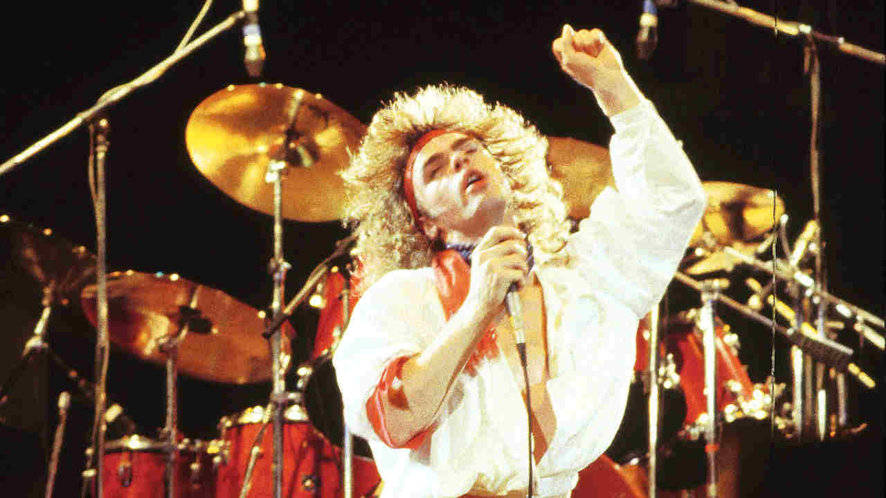 Diamond Head&rsquo;s Sean Harris performing onstage in the early 1980s