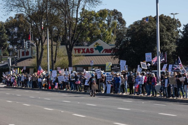 Hundreds protest the killing of Renee Good and the policies of the Trump administration on Saturday, Jan. 10, 2026 in El Cajon, CA. (Zoë Meyers / For The San Diego Union-Tribune)