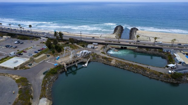 ....The area for the proposed new construction where the large filter screens are located and the discharge pond at the Carlsbad Desalination Plant on Tuesday, June 7, 2022 in Carlsbad, CA. (Nelvin C. Cepeda / The San Diego Union-Tribune)