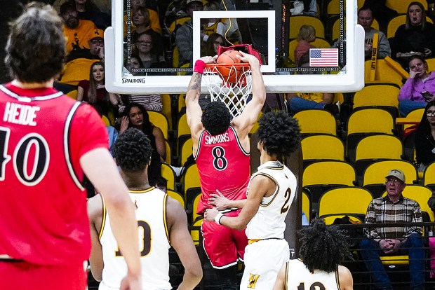 San Diego State's Tae Simmons (8) dunks during the first half of Wednesday's win over the Wyoming Cowboys at Arena-Auditorium in Laramie, Wyo. (Troy Babbitt, Wyoming athletics)