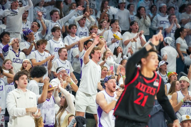 The GCU Arena crowd roars in front of San Diego State's Miles Byrd during Wednesday's 70-69 Grand Canyon win. (Darryl Webb, for The San Diego Union-Tribune)