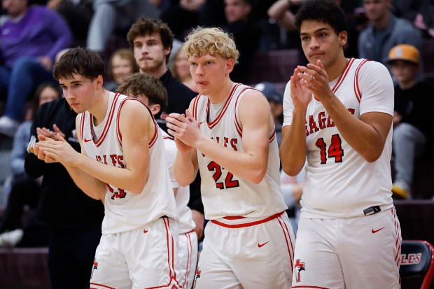 Santa Fe Christian players celebrate after the first half of their game against St. Augustine at Santa Fe Christian High School on Tuesday, Jan. 6, 2026 in Solana Beach, California. (Meg McLaughlin / The San Diego Union-Tribune)