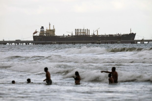 Evana, an oil tanker, is docked at El Palito port in Puerto Cabello, Venezuela, Sunday, Dec. 21, 2025. (AP Photo/Matias Delacroix)