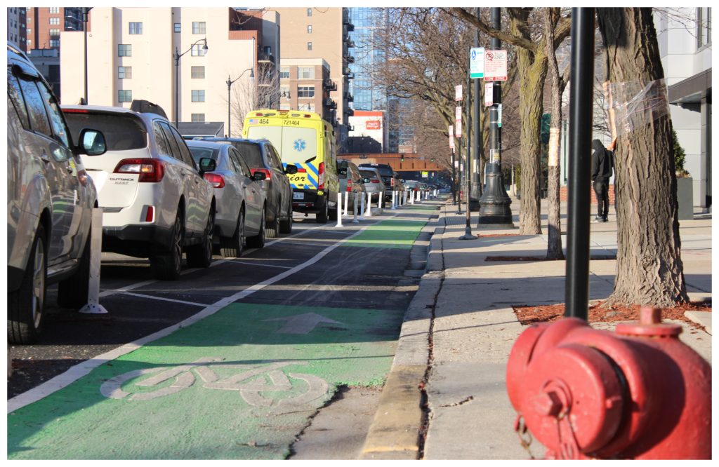 n-progress construction of protected bike lanes at 18th and Wabash Ave have been paused, causing concern among advocates who say the infrastructure keeps cyclists safe.