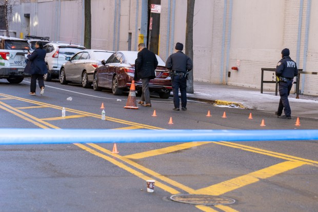 A livery driver was pronounced dead on scene after he was shot in the head in a barrage of gunfire, after which he crashed into a car near 1752 Morris Avenue in the Bronx, on Thursday, Jan. 1, 2026. (Theodore Parisienne / New York Daily News)