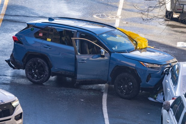 A livery driver was pronounced dead on scene after he was shot in the head in a barrage of gunfire, after which he crashed into a car near 1752 Morris Avenue in the Bronx, on Thursday, Jan. 1, 2026. (Theodore Parisienne / New York Daily News)