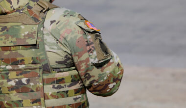 A stock photo of a soldier in fatigues.