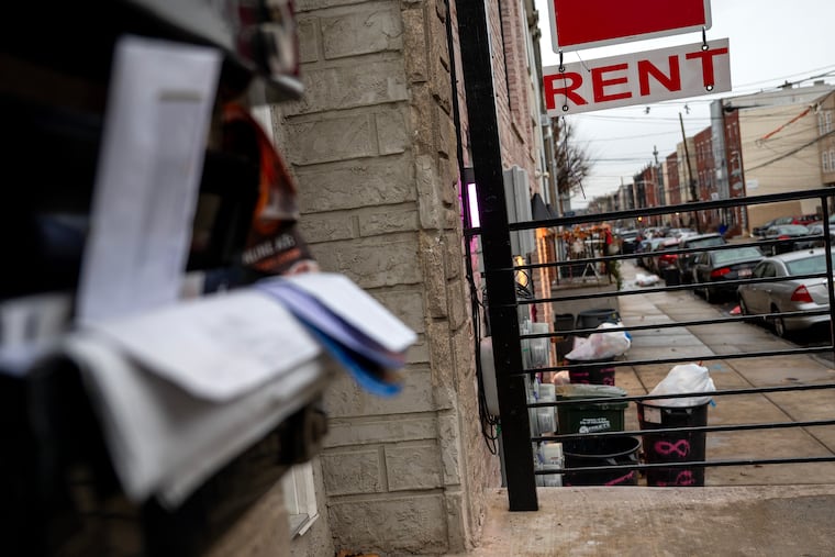 Mail piling up at homes in the 1900 block of N. 18th St  in North Philadelphia on Wednesday, Dec. 10, 2025. Buyers have snapped up $45 million in student housing around Temple University, often paying more than twice what properties were originally listed for, even though rents are down and vacancies are up for student housing.