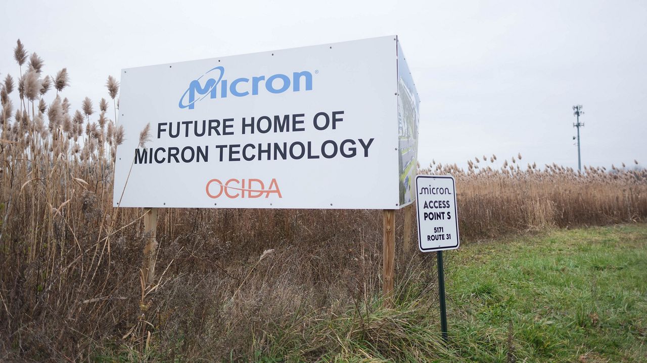 sign in field that reads 'future home of micron technology'