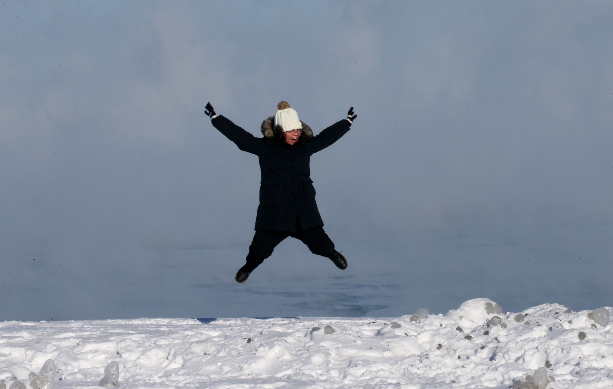 Droves of visitors ignore the cold weather warnings and converge...