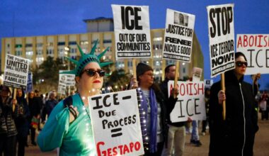 Protesters decry ICE at Dallas City Hall, one year after Trump’s inauguration