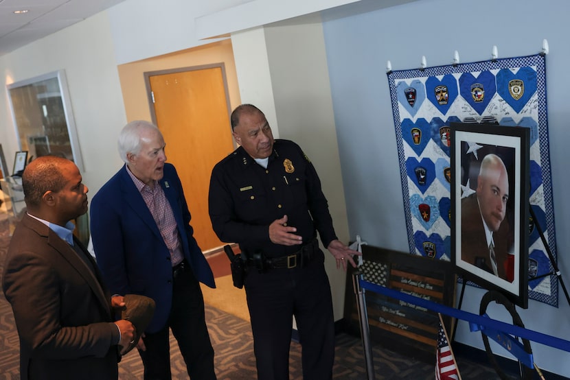 Dallas Mayor Eric Johnson (left) and Sen. John Cornyn, R-Texas, get a tour of the Dallas...