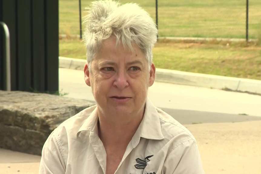 A woman looks distressed