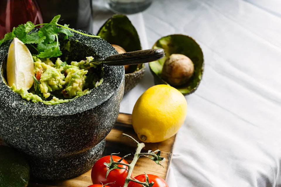 If you use half a medium-sized avocado to make your dip, you're getting another portion in. (Getty Images)