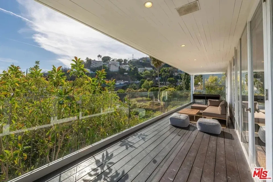 The seamless balcony addition to the bedrooms provides even more panache to the home.