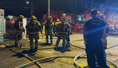 Two dogs died and three people, including a police officer, suffered smoke inhalation in an apartme...