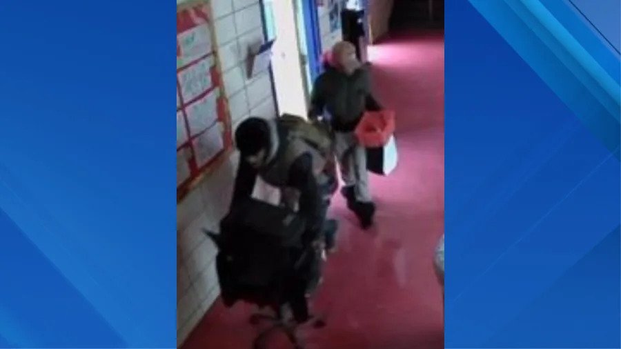 The suspects entered the American Dream Charter School and stole electronics, police say. (Credit: NYPD)