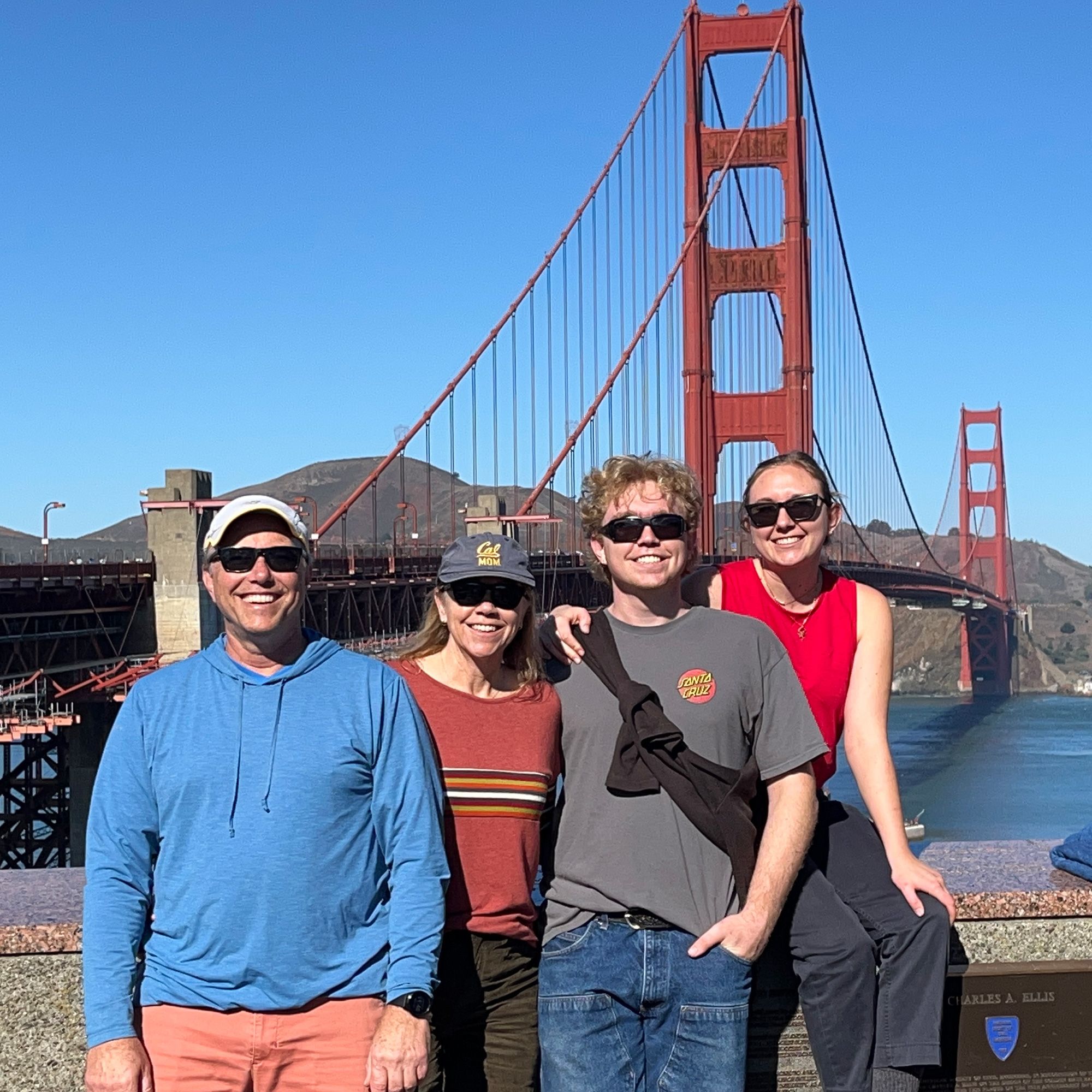 Valerie Zeko and her family pose by the Golden Gate...