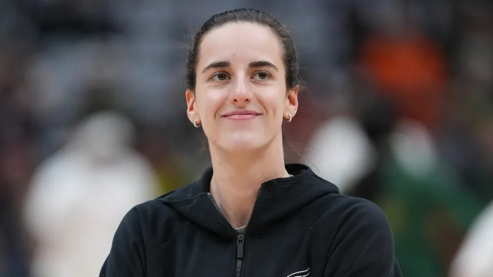 Caitlin Clark looks on before the game against the Seattle Storm at Climate Pledge Arena on August 03, 2025 in Seattle, Washington. 