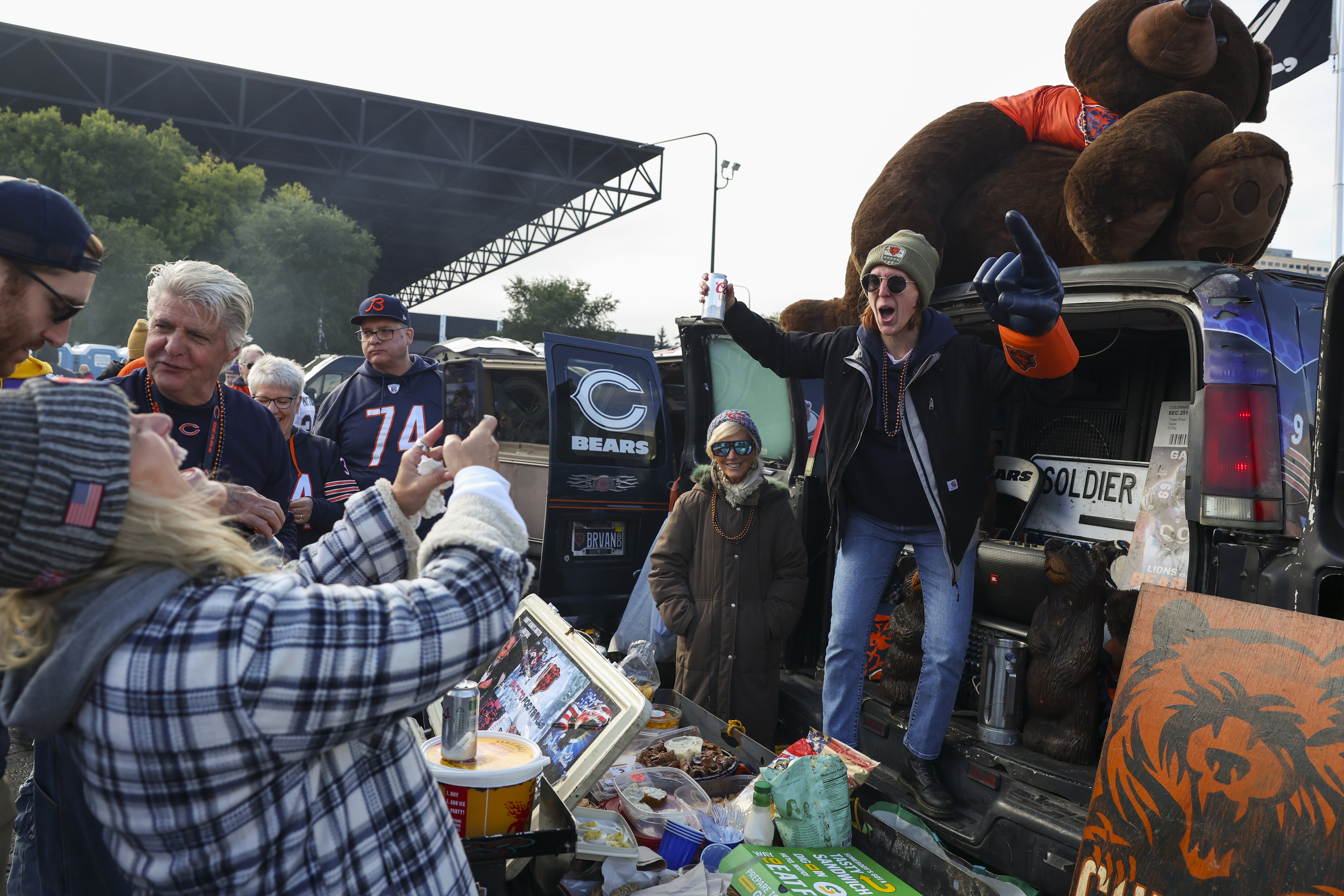 Hailey Grabowski, right, poses for her mother, Anne Grabowski, outside...