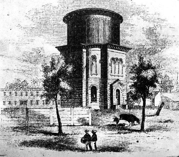An exterior view shows an old water tank, circa 1870, that on Jan. 1, 1873, formally opened as the first home of the Chicago Public Library, which stood on a lot at the southeast corner of LaSalle and Adams Streets. (Chicago Public Library) 