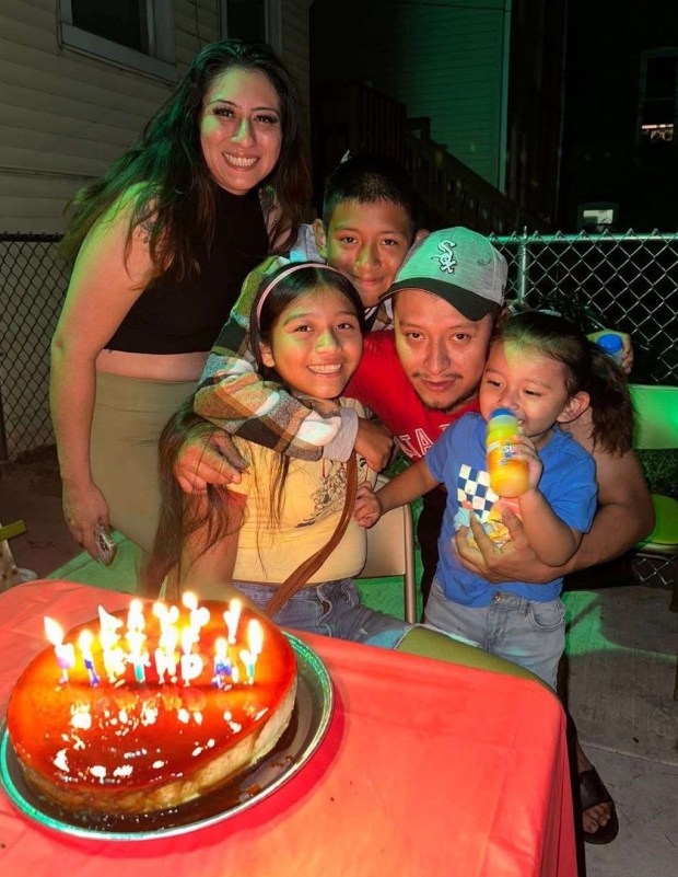 Juan Espinoza Martínez with his wife Bianca Hernandez and their three U.S. born children. Espinoza Martínez is facing deportation despite a jury finding him not guilty of putting a hit on Gregory Bovino, the chief of Border Patrol, during Operation Midway Blitz. (Family photo)