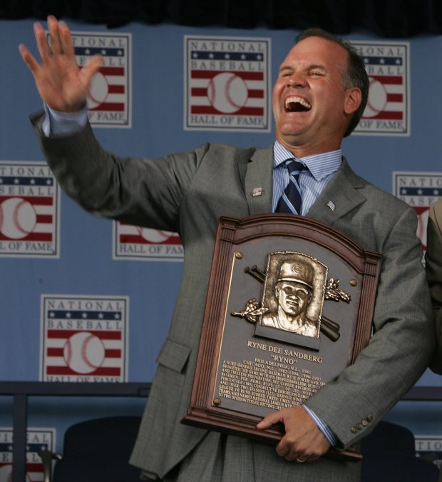 Ryne Sandberg, clutching his Hall of Fame plaque, waves to the Cooperstown, New York, crowd on July 31, 2005. (Phil Velasquez/Chicago Tribune)