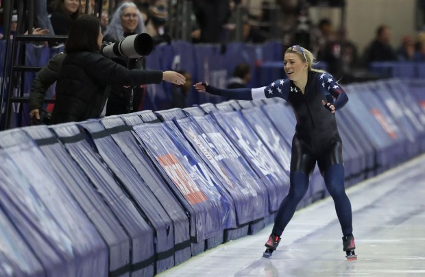 Sarah Warren skates to celebrate with her mom, Cathy Connelly-Warren, after finishing second in the women's 500-meter event and qualifying for the Milan Olympics, Jan. 5, 2026, during the U.S. Olympic Team Trials Long Track at the Pettit National Ice Center in Milwaukee. (Brian Cassella/Chicago Tribune)