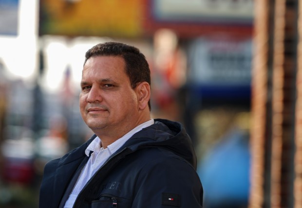 Luis Jose Castro stands outside of his office along West 26th Street on Jan. 9, 2026, in Chicago. Castro is from Puerto La Cruz, Venezuela. (Stacey Wescott/Chicago Tribune)
