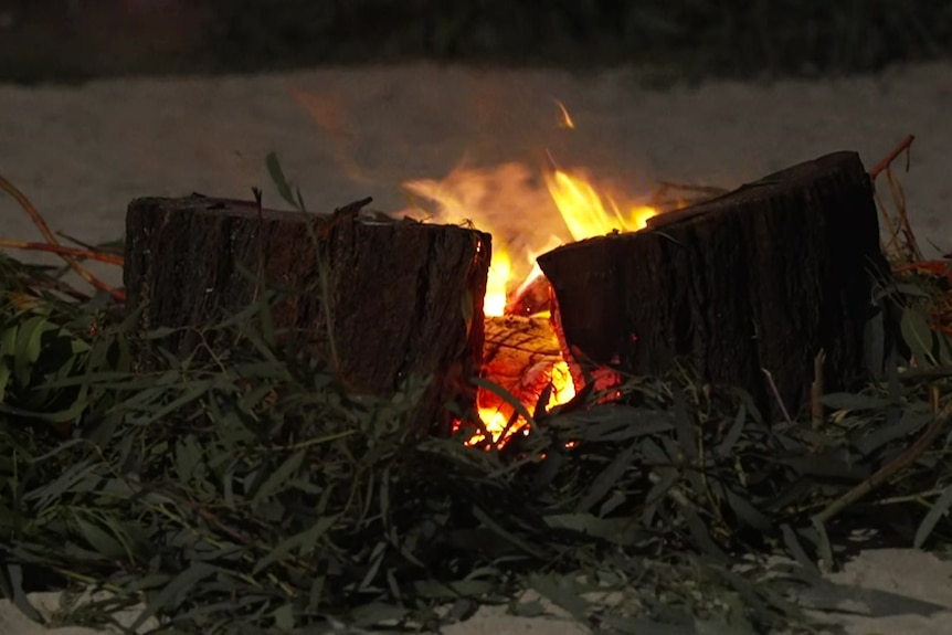 Photo of logs on fire
