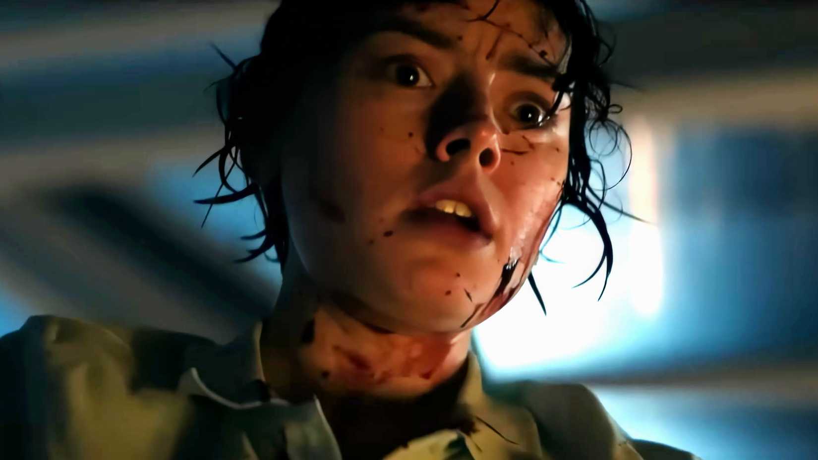 Daisy Ridley's Ava looking shocked with blood on her face in We Bury the Dead