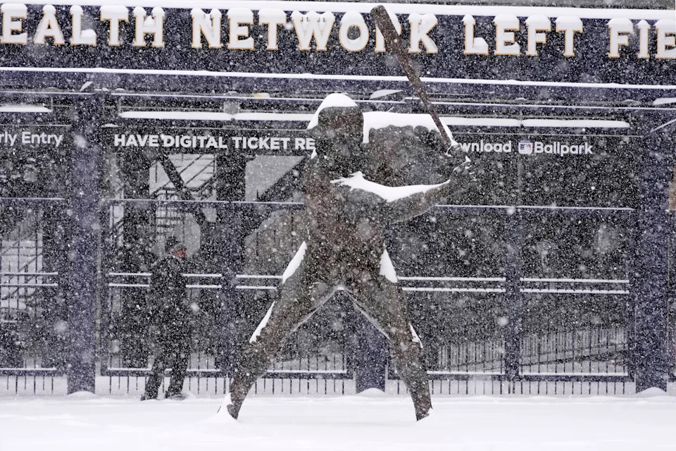 A man walks past a statue of Pittsburgh Pirates baseball Hall of Fame Willie Stargell outside PNC Park on the Northside of Pittsburgh at mid-morning on Jan. 25, 2026.
