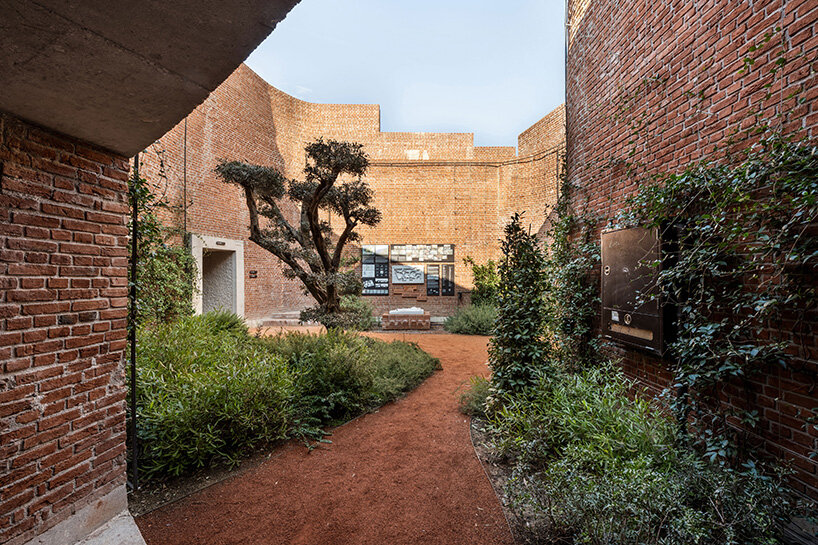 earth-covered domes and brick vaults shape liberation museum of manisa in turkey