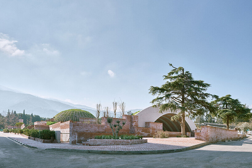 earth-covered domes and brick vaults shape liberation museum of manisa in turkey