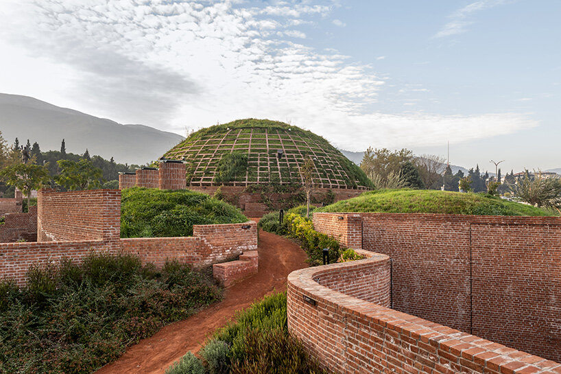 earth-covered domes and brick vaults shape liberation museum of manisa in turkey