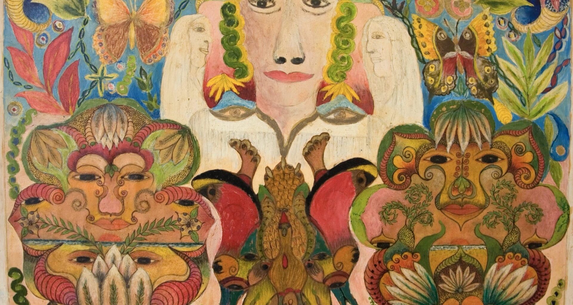 A mixed-media drawing by Minnie Evans of a face surrounded by foliage, flowers, and other faces