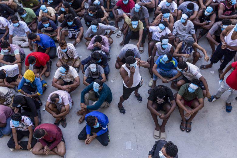 Alleged scam center workers and victims during an operation on illicit activity at the KK Park complex in Myanmar's eastern Myawaddy township on February 26, 2025.