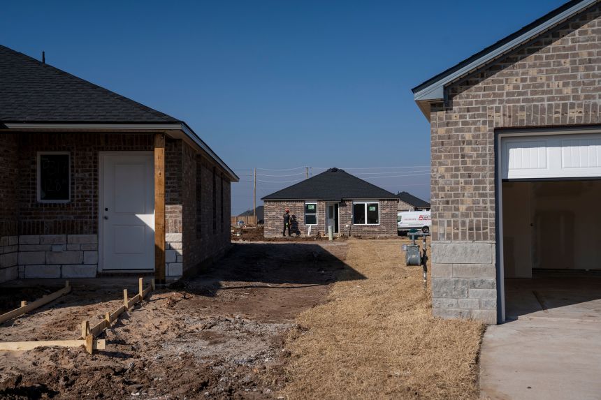New homes under construction at a development in Yukon, Oklahoma, on December 5, 2025.