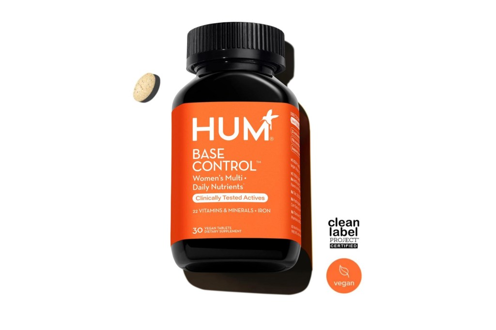 A black bottle with orange label