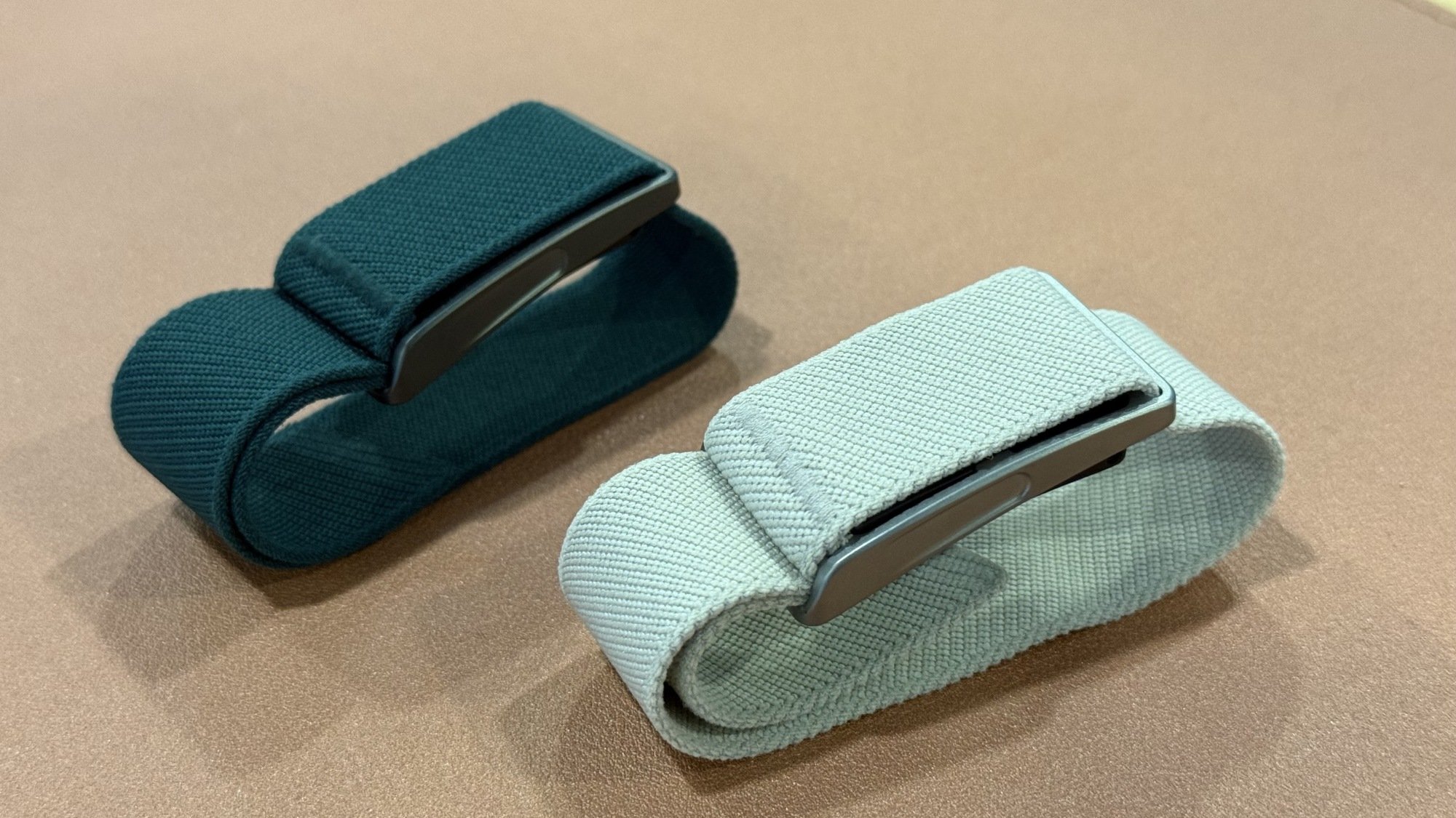 Speediance Strap prototypes, on a table