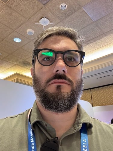 Timothy Werth wearing MemoMind Memo One AI Glasses at CES 2026.
