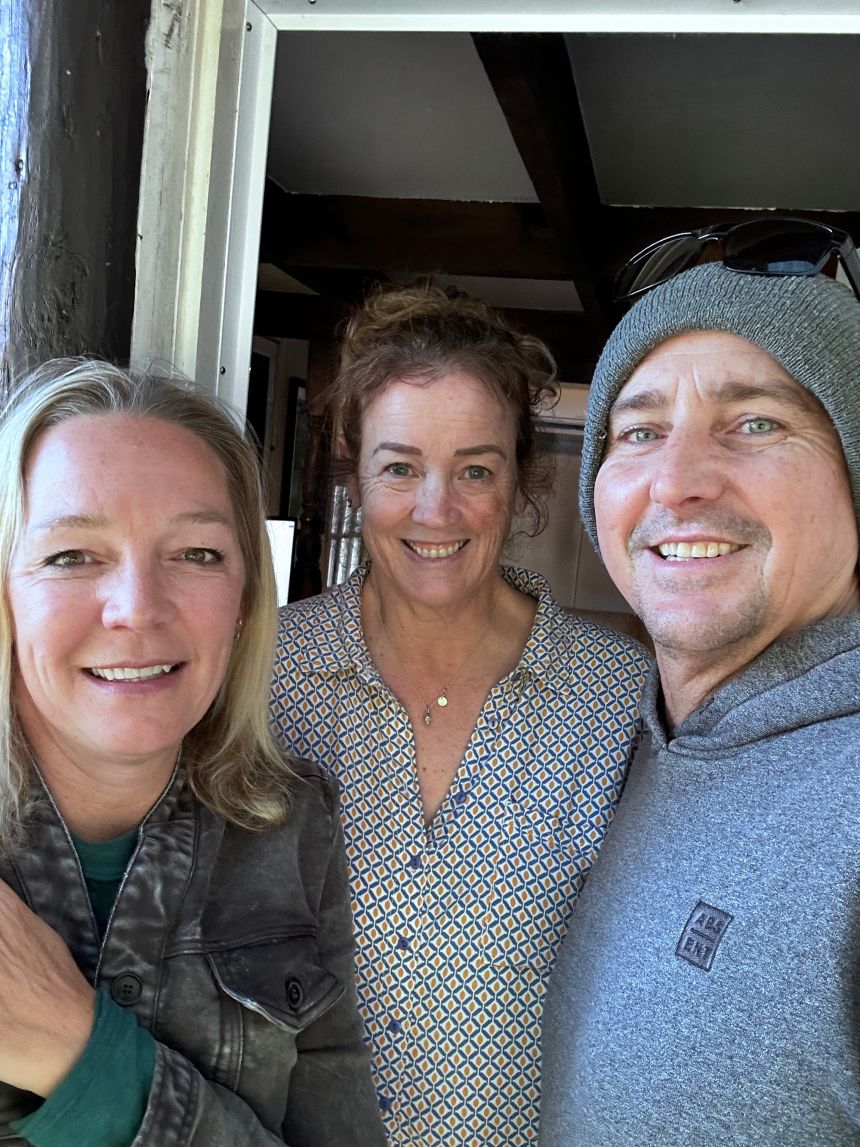 Terry Ward, left, reunited in New Zealand with her friends Sandy and Jake in August 2025.