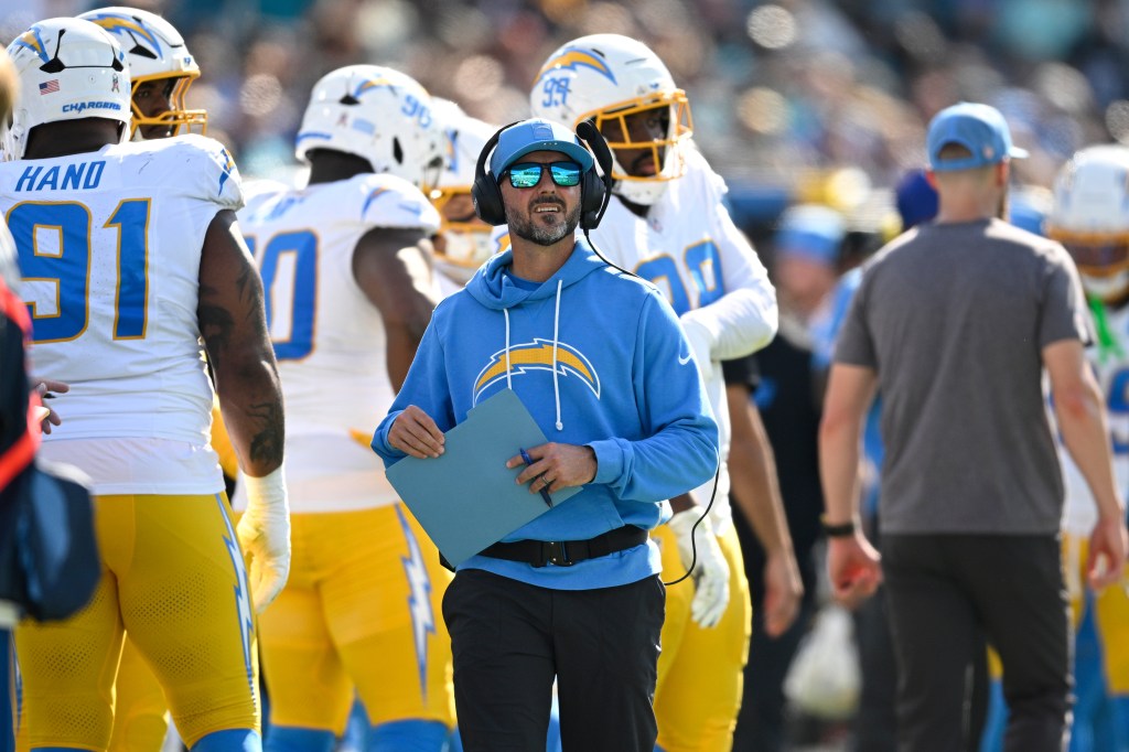 Los Angeles Chargers defensive coordinator Jesse Minter on the sideline during a football game.