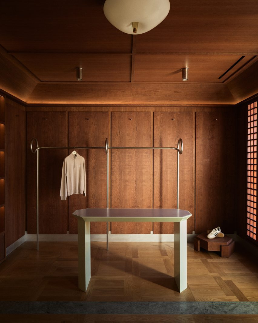 Boutique with walls and ceilings lined with cherry wood panelling