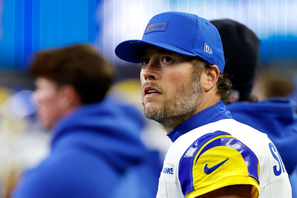 Matthew Stafford of the Los Angeles Rams in a blue cap during the NFC Championship game.