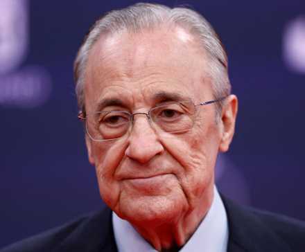 Real Madrid president Florentino Perez poses for pictures.